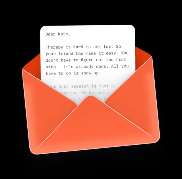An open envelope with a handwritten letter
